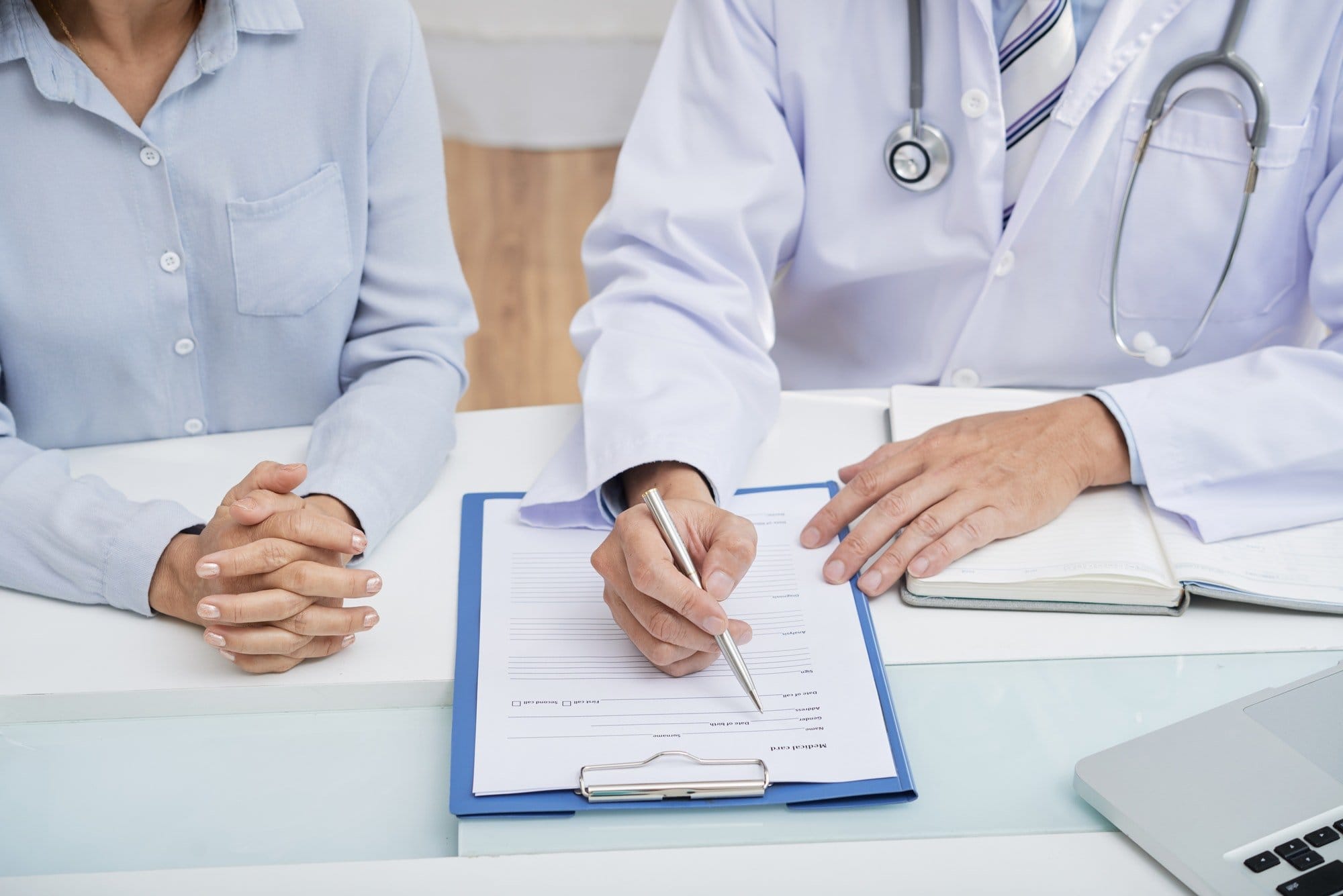 Patient Filling In Medical History Forms